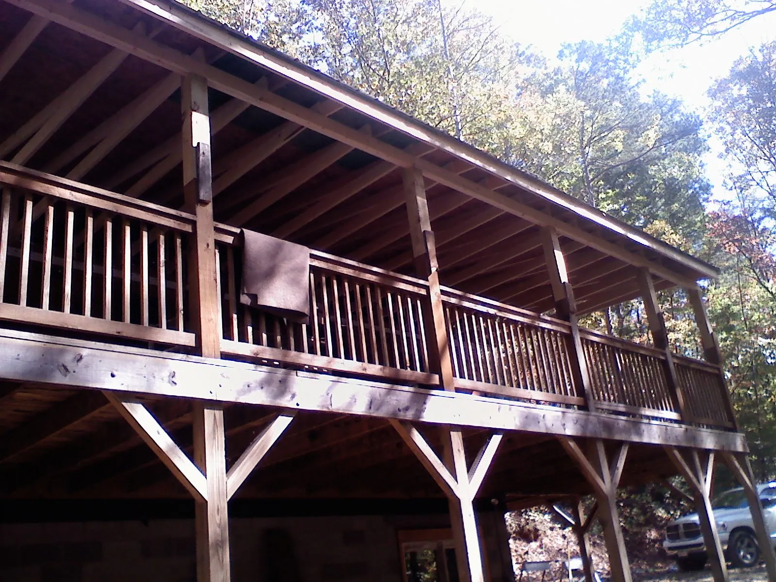 Timber framing under a new elevated porch and deck — Roof Leak Repair in Southborough by Roofing Brothers